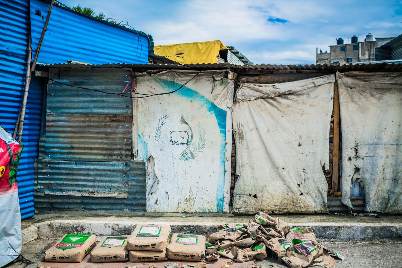 House with Guatemalan flag painted on door